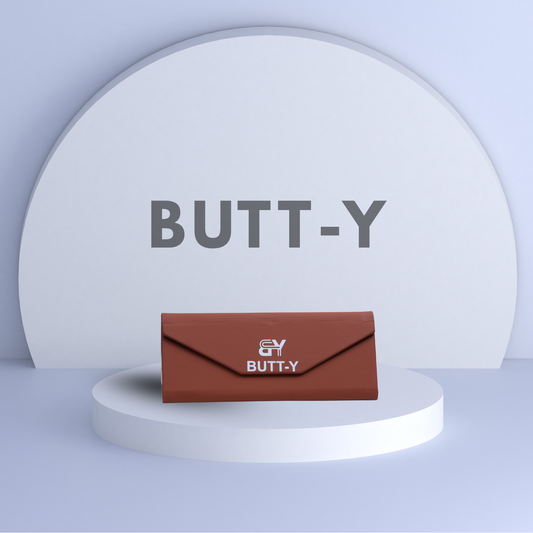 Brown wallet with 'GY BUTT-Y' branding on a white platform with a gray background