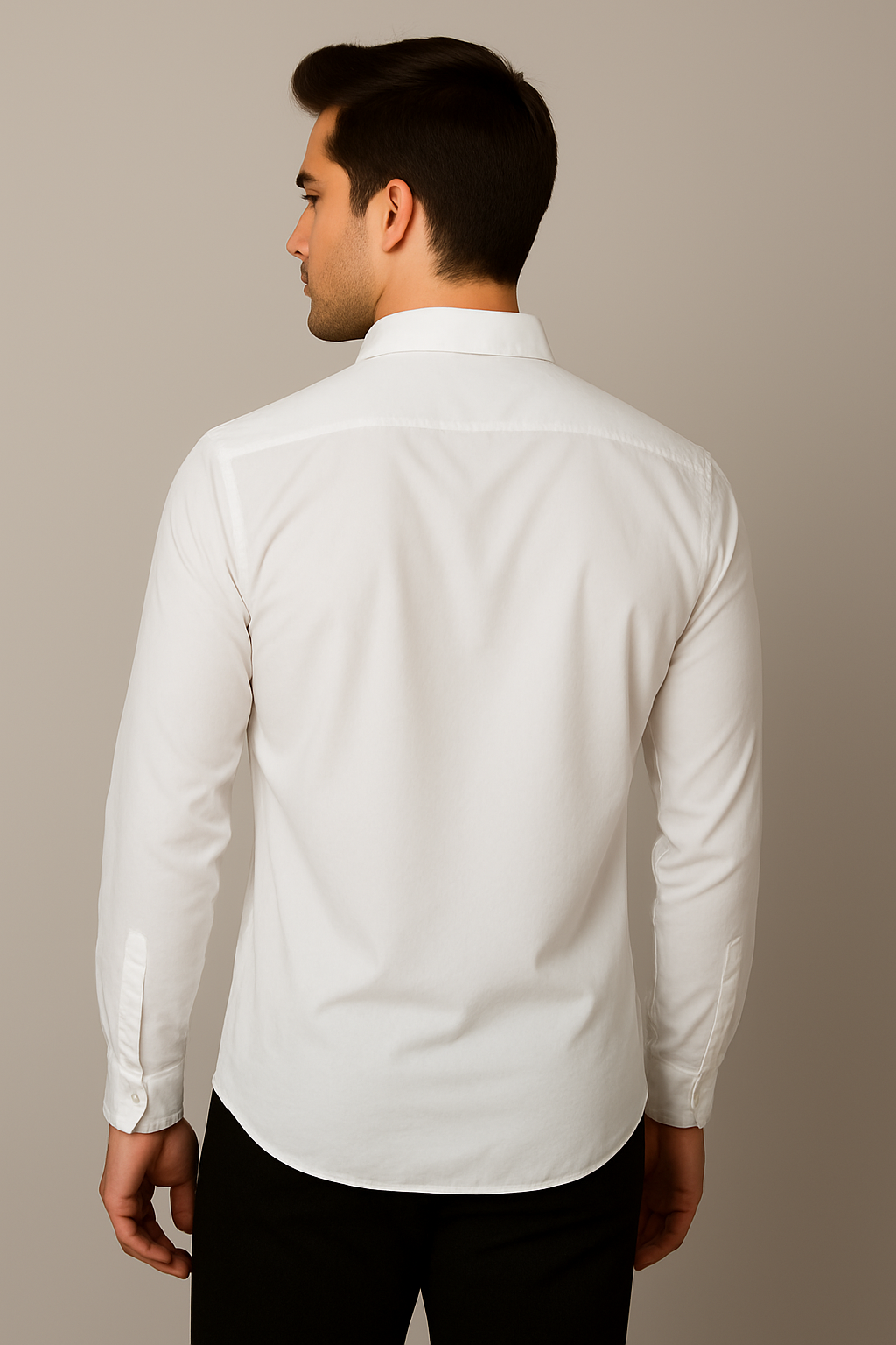 Man wearing a white dress shirt against a beige background
