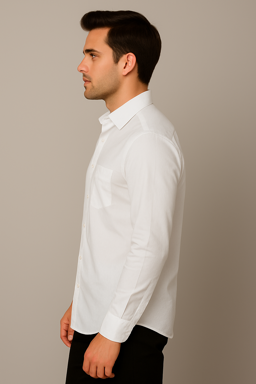Man wearing a white dress shirt against a beige background
