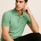 Effortless Style. Everyday Comfort. – BUTT-Y® Men’s Pista Green Polo T-Shirt with Signature Logo