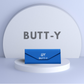 Blue pouch with 'GY BUTT-Y' branding on a white platform with a gray background