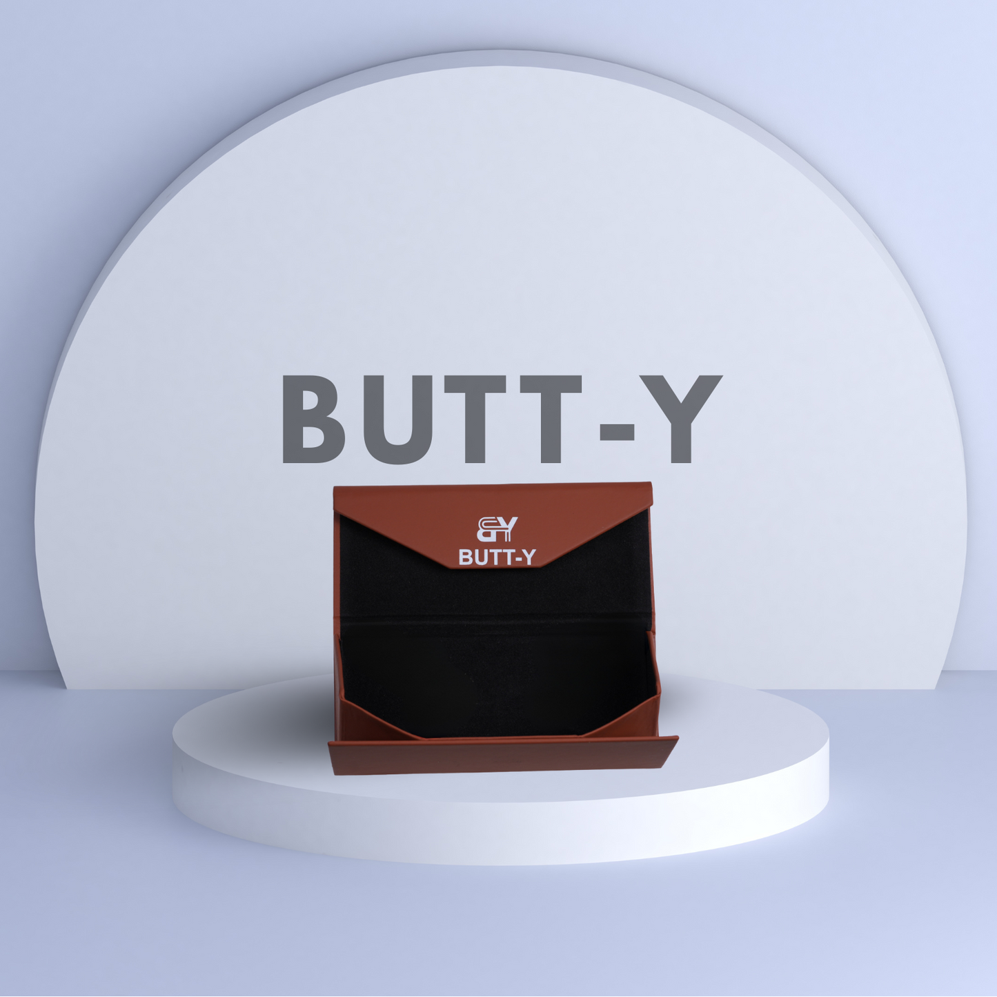 Product packaging with 'GY BUTT-Y' branding on a white platform with a light gray background.