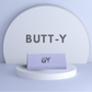 Purple product with 'GY' logo on a white platform against a light gray background