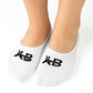 White socks with black logo worn by a doll on a white background