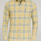Yellow plaid shirt on a gray background