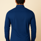 Man wearing a blue shirt against a beige background