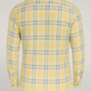 Yellow checkered shirt on a light gray background