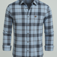 Plaid shirt with a logo on a gray background